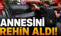 Annesini rehin aldı!